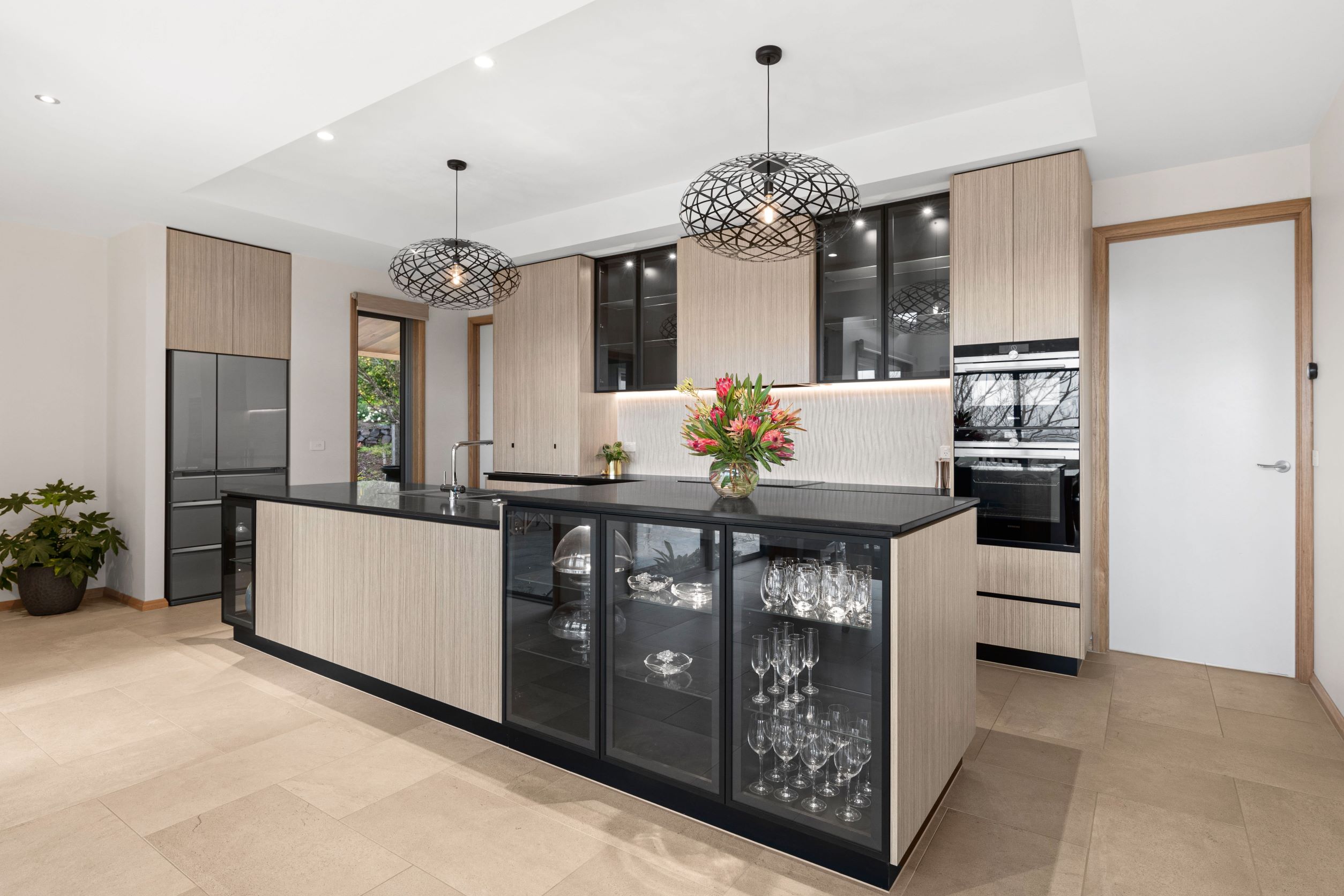 Incorporating a kitchen island into your design, it optimises space